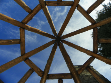 Custom rustic log gazebo trussing by Adirondack LogWorks
