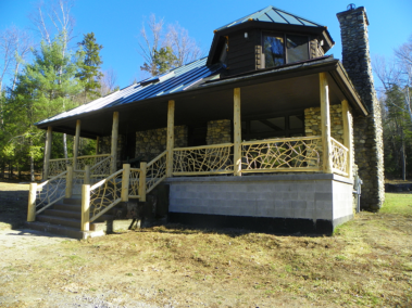 Custom rustic twig railings and log posts by Adirondack LogWorks