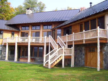 Custom rustic log railings and log post woodwork by Adirondack LogWorks