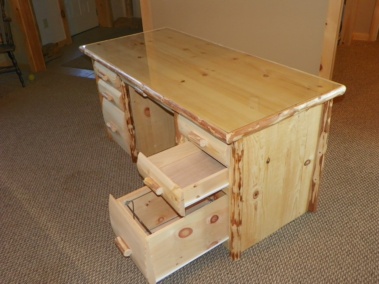 Rustic log desk with drawers and live-edge log trim by Adirondack LogWorks