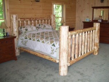 Rustic log queen bed by Adirondack LogWorks
