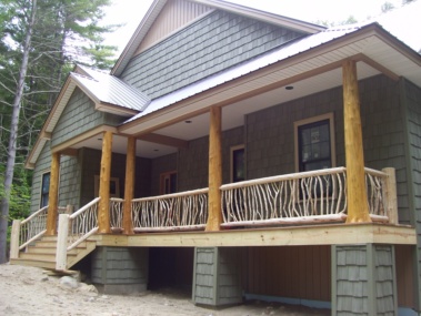 Custom-made vertical twig log railings by Adirondack LogWorks