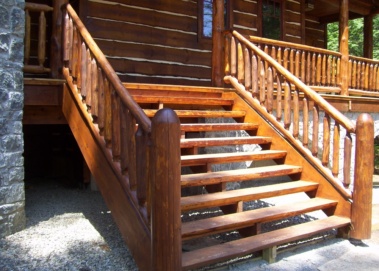 Custom-made log railings and stairs by Adirondack LogWorks