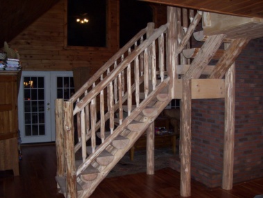 Custom log stair and railing rustic woodwork by Adirondack LogWorks