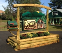 Custom log rustic sign and mailbox support twig woodwork for Rowe's Cabins of Schroon Lake by Adirondack LogWorks