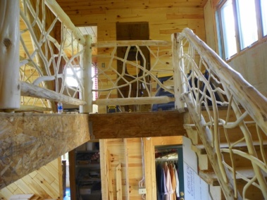 Custom rustic log railings, log posts, and twig rails by Adirondack LogWorks