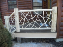 Custom rustic twig railings and log posts by Adirondack LogWorks